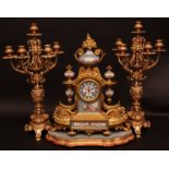 Late 19th century French gilt, brass and porcelain mounted mantel clock, the arched case