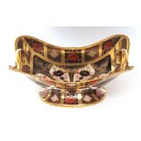 Royal Crown Derby two-handled shaped rectangular comport on an oval foot, decorated in colours