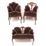 Edwardian salon suite, mahogany framed and upholstered in designer fabric, comprising a two-seater