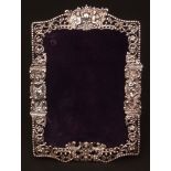 Victorian easel backed photograph frame, the cast and pierced surround with beaded border and floral