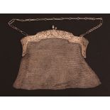 George V Continental evening purse, the hinged frame with pierced and engraved foliate decoration,