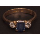Modern 18ct gold sapphire and diamond ring, the rectangular cut sapphire (7 x 5mm approx), claw