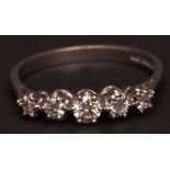 Modern 18ct white gold five-stone diamond ring, having five circular brilliant cut diamonds, coronet