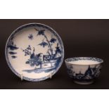 A rare Lowestoft early tea bowl and saucer, c1760, decorated in dark tones of blue with peony,