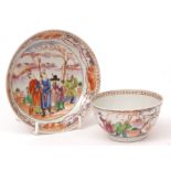 Chinese 18th century famille rose tea bowl and saucer decorated with figures and their attendants in