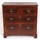 18th century walnut veneered on pine chest, the top and both sides decorated with panels of