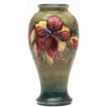 Moorcroft "Hibiscus" pattern large vase of tulip baluster form, typically decorated on a washed