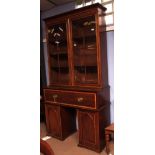 Early 19th century mahogany and satinwood cross banded secretaire bookcase, with moulded cornice