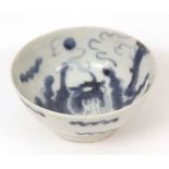 Chinese Provincial blue and white porcelain bowl, late Ming, decorated with dragon amidst