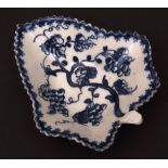 A Lowestoft pickle dish c1770 of trefoil shape decorated in dark blue with a fruiting vine within