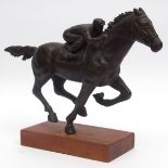 Bronze study of a jockey on his mount at full gallop, 11ins high