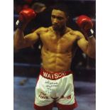 Signed photographic print depicting Michael Watson (b 1965), the boxer with his arms aloft, signed