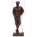 Copper-coloured plaster or resin figure of a golfer, base signed A Danel (Austin Productions Inc