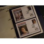 Four Folders: assorted 1st day covers with coins, to include The Royal Family, The World Cup