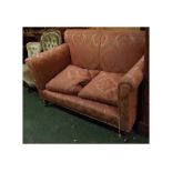 19th century mahogany framed drop end sofa with puce and foliage upholstery, raised on tapering