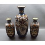 Pair of 20th century cloisonn vases, with geometric designs of square-bodied form, together with a