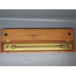 Mahogany cased brass parallel rule by W Newman & Co Ltd of Calcutta, 24" wide