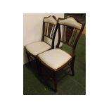 Near pair of Edwardian mahogany framed bedroom chairs with inlaid back and cream upholstered seat