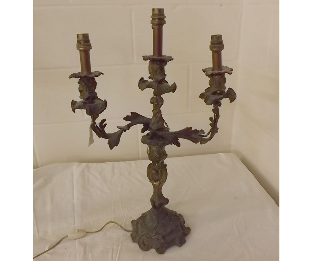 Gilt metal rococo style two branch electrified candelabrum, pair of wall sconces and three branch