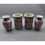 Pair of 20th century Imari decorated cylindrical pots (A/F), together with a pair of bulbous Imari