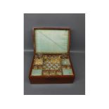 Painted table top sewing box with decorative pierced cast relief and top loop handle with fitted