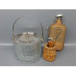 Wicker and glass formed small bottle, together with a further cane cased glass bottle with latched