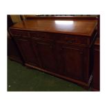 Reproduction yew wood dresser base with three drawers over three panelled cupboard doors, on bracket
