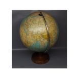 Philips 13 1/2 ins terrestrial globe, raised on circular stand