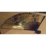 Large Oriental fan, the panel painted with exotic birds and foliage on a gilded ground, 30" long