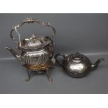 Victorian etched and shaped body spirit kettle on stand, supported by four paw feet, together with a