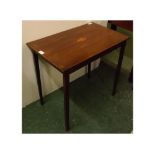 Edwardian mahogany rectangular side table with inlaid oval shell detail and banding throughout,