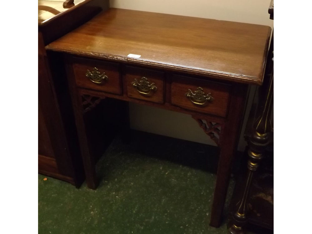 19th century mahogany three-drawer lowboy on four square legs, fretwork corner supports, 28ins x