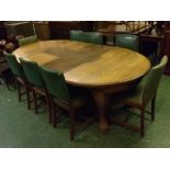 Early 20th century oak oval extending dining table raised on shaped pad feet, 95ins x 48ins together