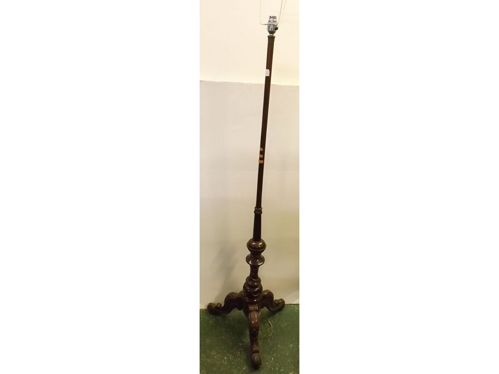 19th century mahogany pole screen converted to a standard lamp on a carved tripod base with