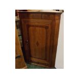 19th century oak and mahogany banded corner hanging cupboard with single door, single drawer with
