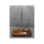 Set of S Maw, Son & Sons Ltd brass balance scales, with wooden drawer base with name plaque