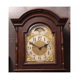 Second half of 20th century stained oak cased triple weight driven longcase clock, the hood with