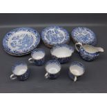 Set of Copeland Spode bone china tea wares, in Willow pattern, comprising four tea cups, four