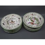Set of early 20th century continental porcelain dessert wares, featuring exotic birds amongst