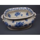 Reproduction blue and white footbath, of shaped oval form, two side handles, decorated with tulips