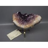 Large mineral sample "Amethyst" with brass stand attached, Harrods label inscribed "Minas Gerais,