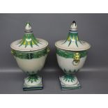 20th century Rouen Majolica lidded vases on square bases, lion mask ring handles, pointed finial