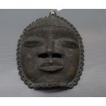 Vintage bronze or cast metal Thai mask, 10ins high