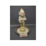 Wilkinson Ltd (Royal Staffordshire Pottery) china figure mounted match holder/striker/ashtray,