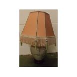 20th century floral painted ceramic based table lamp with pink shade, 22 ins tall (including shade)