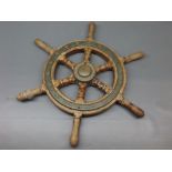 Vintage teak and brass mounted ships wheel, inscribed "Belle Isle Teak, 23 High Road Rayleigh