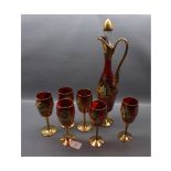 Set of six red Murano glass goblets with raised floral leaf with matching decanter and stopper