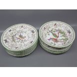 Set of early 20th century continental porcelain dessert wares, featuring exotic birds amongst