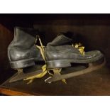 Pair of vintage black leather boot ice skates