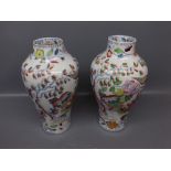 Pair of 19th century Mason's Ironstone vases, with bird of paradise decoration amongst foliage, 9